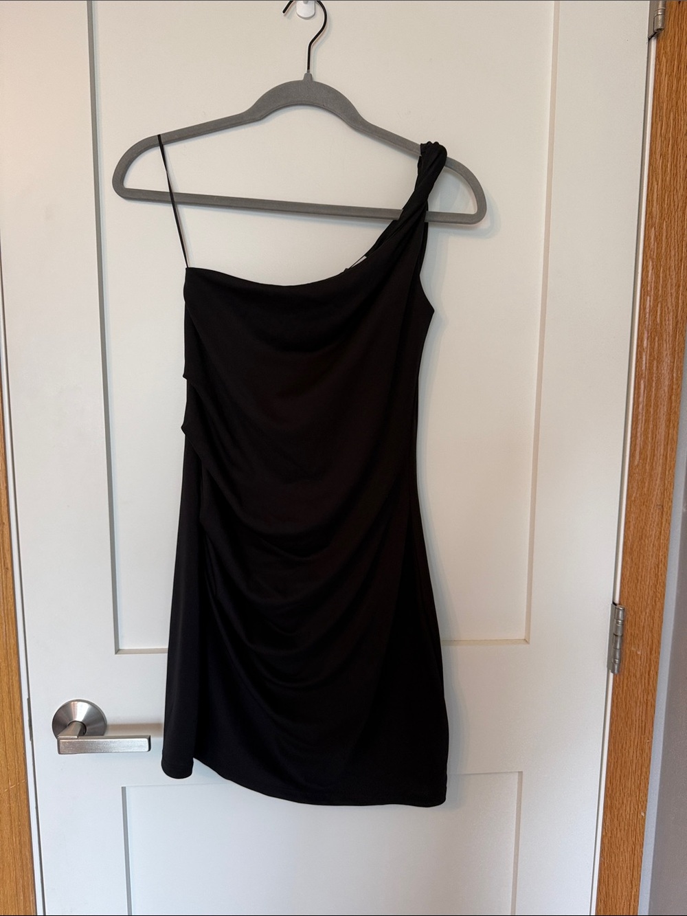 Black One-Shoulder Mini Dress. Twist one shoulder